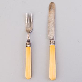 CUTLERY, 12+12, silver with bone handles, Sheffield 1894.