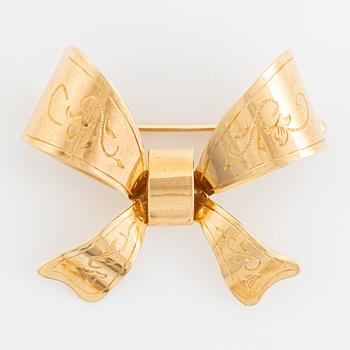 Brooch, bow, 18K gold. Stigbert, Engelbert, Stockholm.