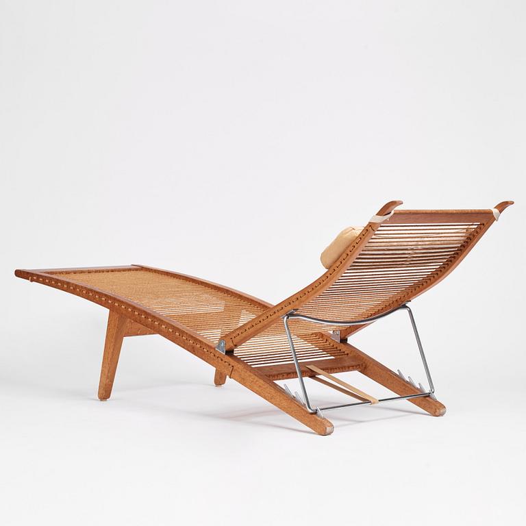 Hans J. Wegner, an oak lounge chair model "JH 524", Johannes Hansen, Copenhagen.