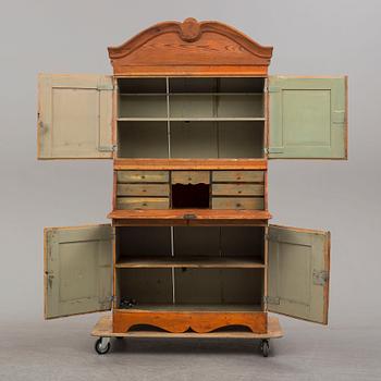 a painted wooden cabinet from the 19th century.