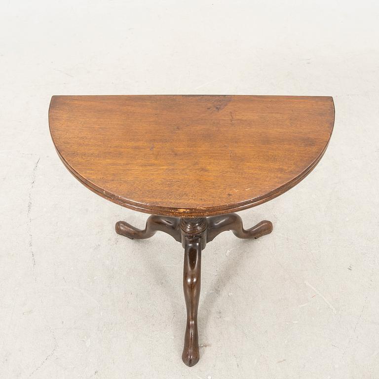 An English Queen Anne mahogany folding table 18th century.