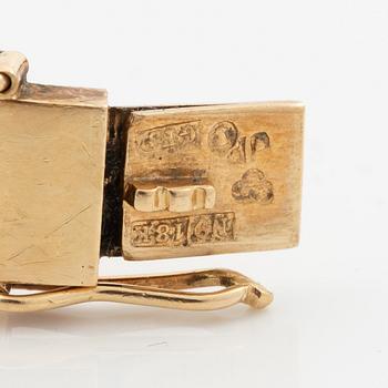 18K gold bracelet.