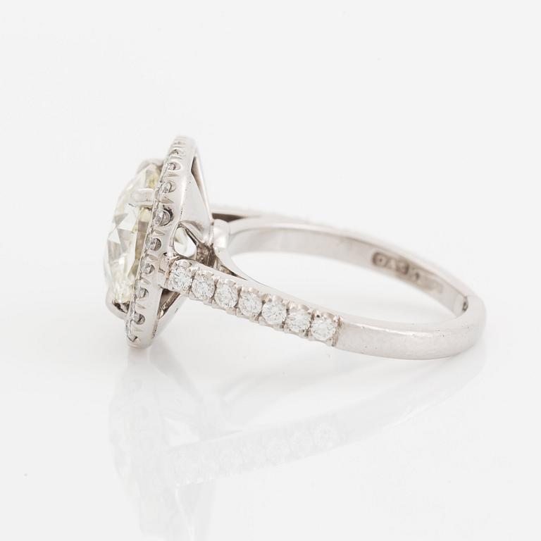 A platinum ring set with a cushion formed old-cut diamond 3.39 cts J vs1 according to accompanying HRD-certficate.