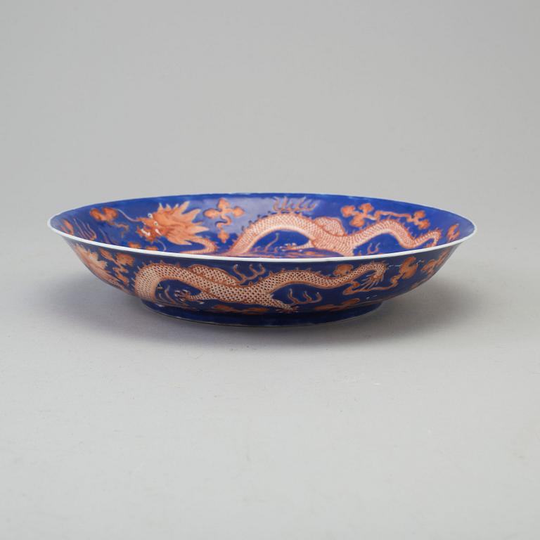 A iron-red and blue porcelain dish, 20th century, with Guangxus six character mark.