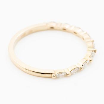 14K gold ring with marquise-cut diamonds.