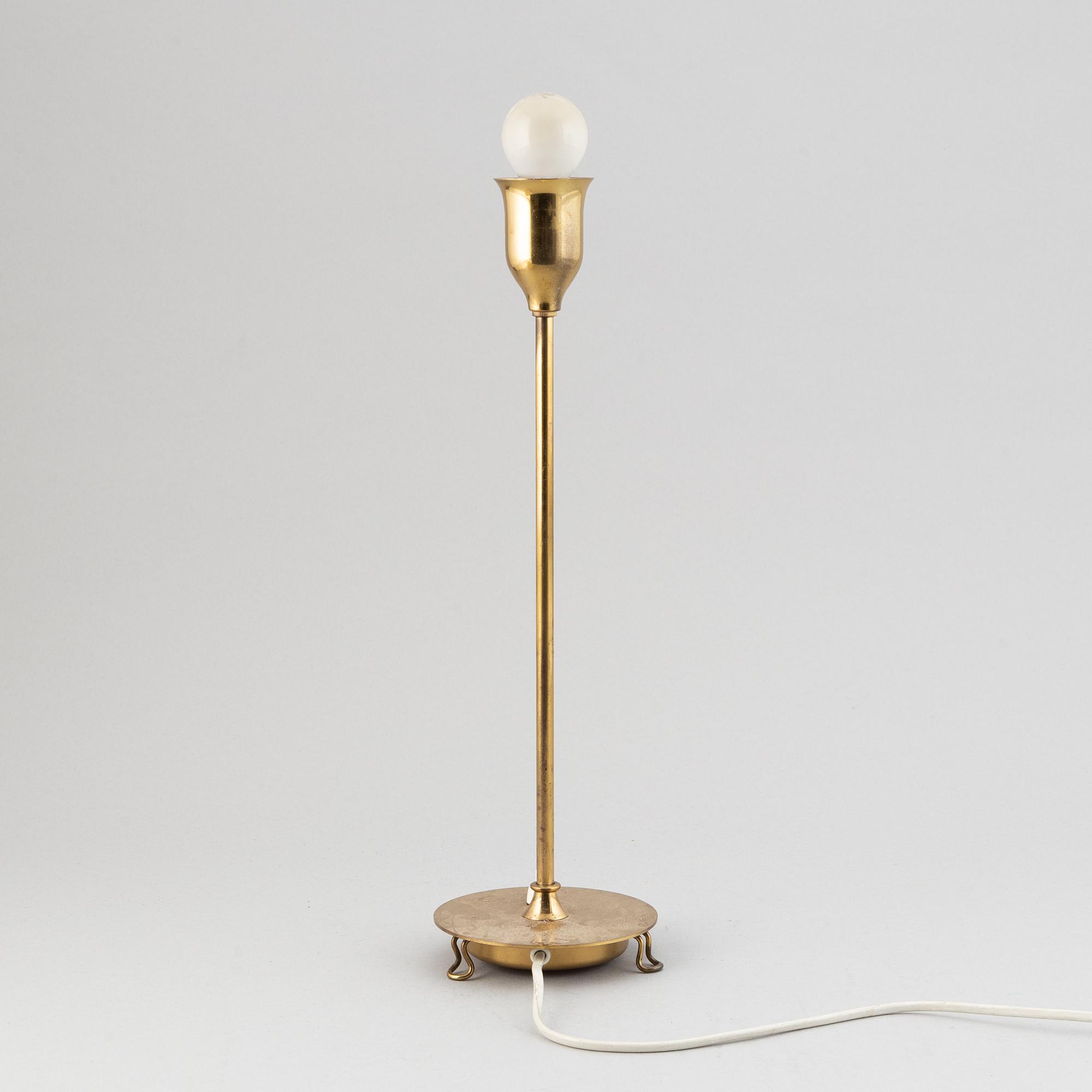 A model 2552 brass table lamp by Josef Frank for Firma Svenskt Tenn.