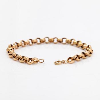 A 14K gold bracelet.