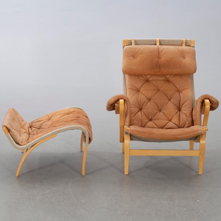 BRUNO MATHSSON, "Pernilla" armchair and stool from DUX.