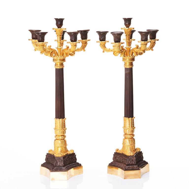 A pair of French Louis Philippe six light candelabra, around 1830.