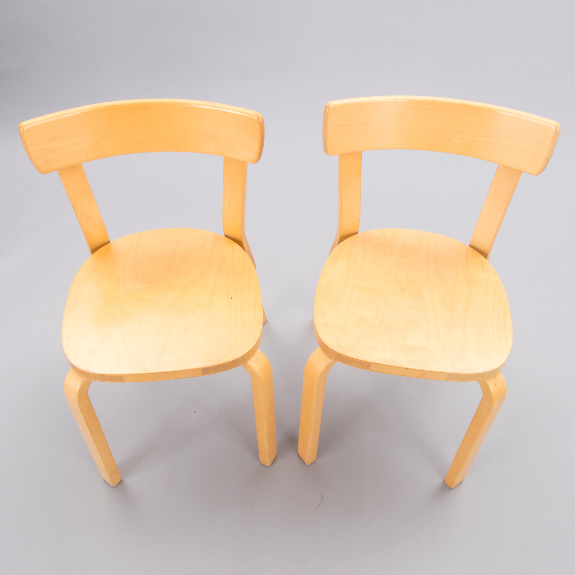 A Set of Three model 69 Chairs by Artek, late 20th Century.