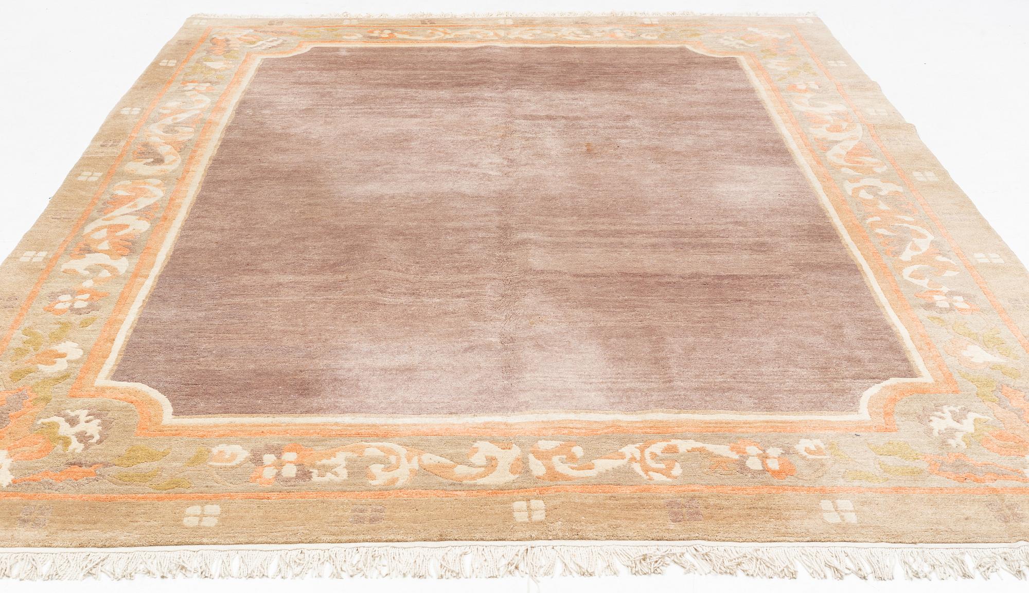 A carpet, Tibet, c. 245 x 357 cm.