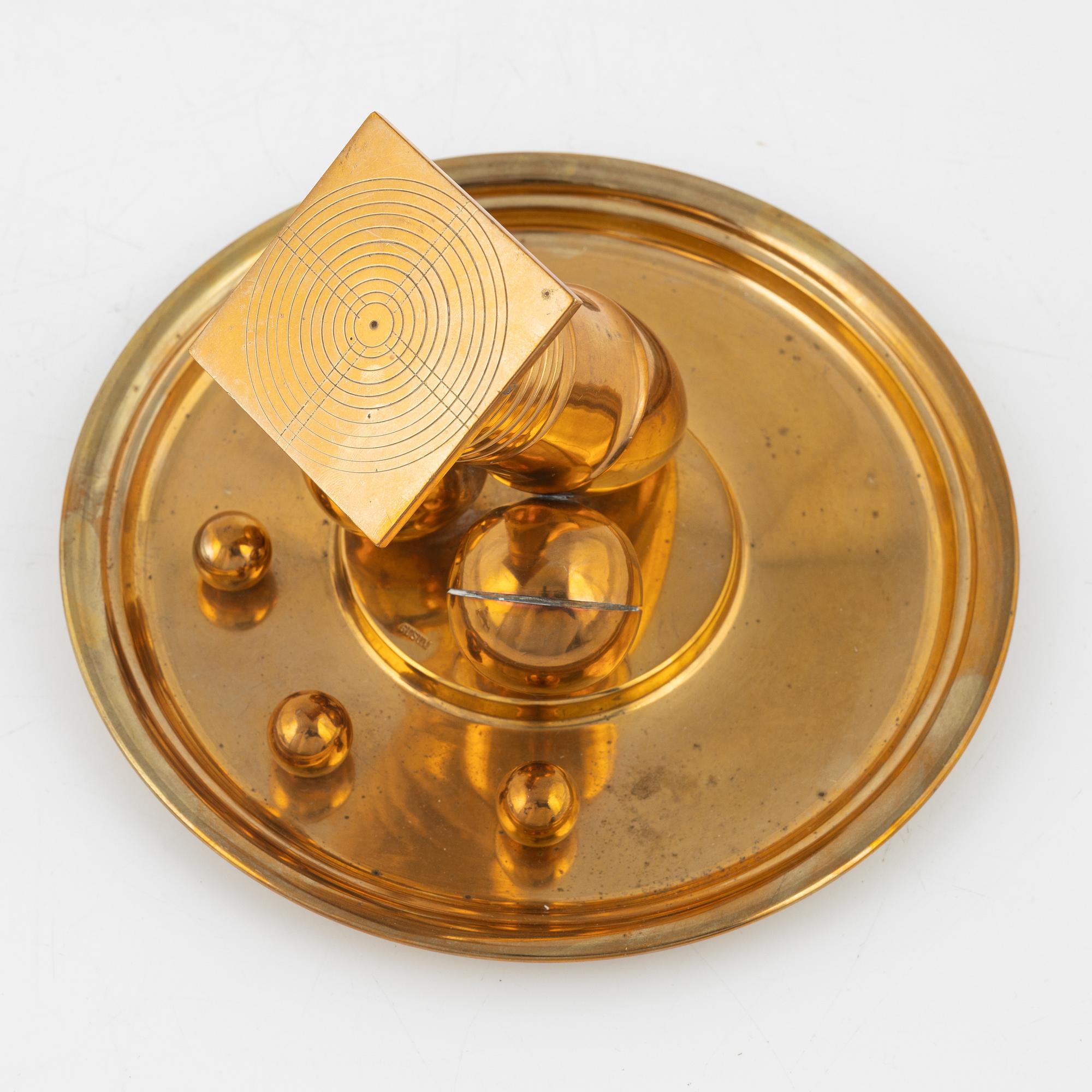 A four-piece brass writing set, Gusum, 20th century.