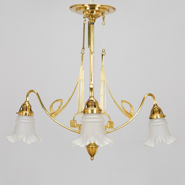 Kattovalaisin, 1900-luvun alku.