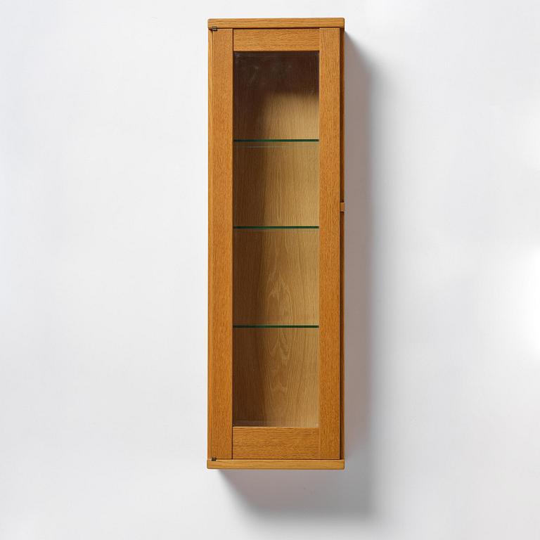 James Krenov, an oak or doussie showcase wall cabinet, executed in his own workshop, Bromma, Sweden.