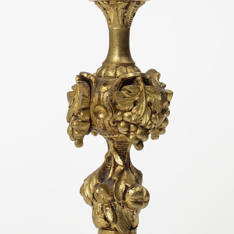 A pair of Oscarian brass candle sticks, Sweden, late 19th century.