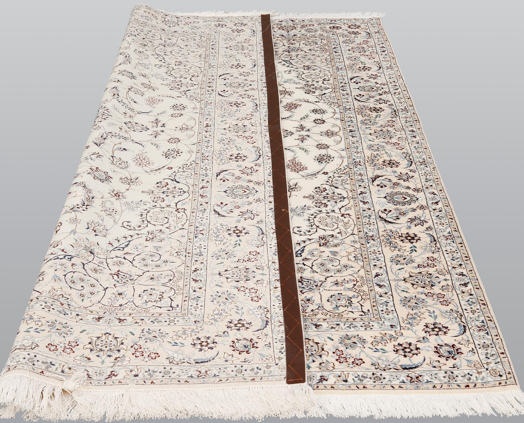 A carpet, Nain Part Silk, sk 6LAA, 220 x 159 cm.