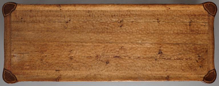 Gustaf Fjaestad, an Art Nouveau carved pine table, Arvika Sweden 1914, a double to the table in the Thiel Collection,