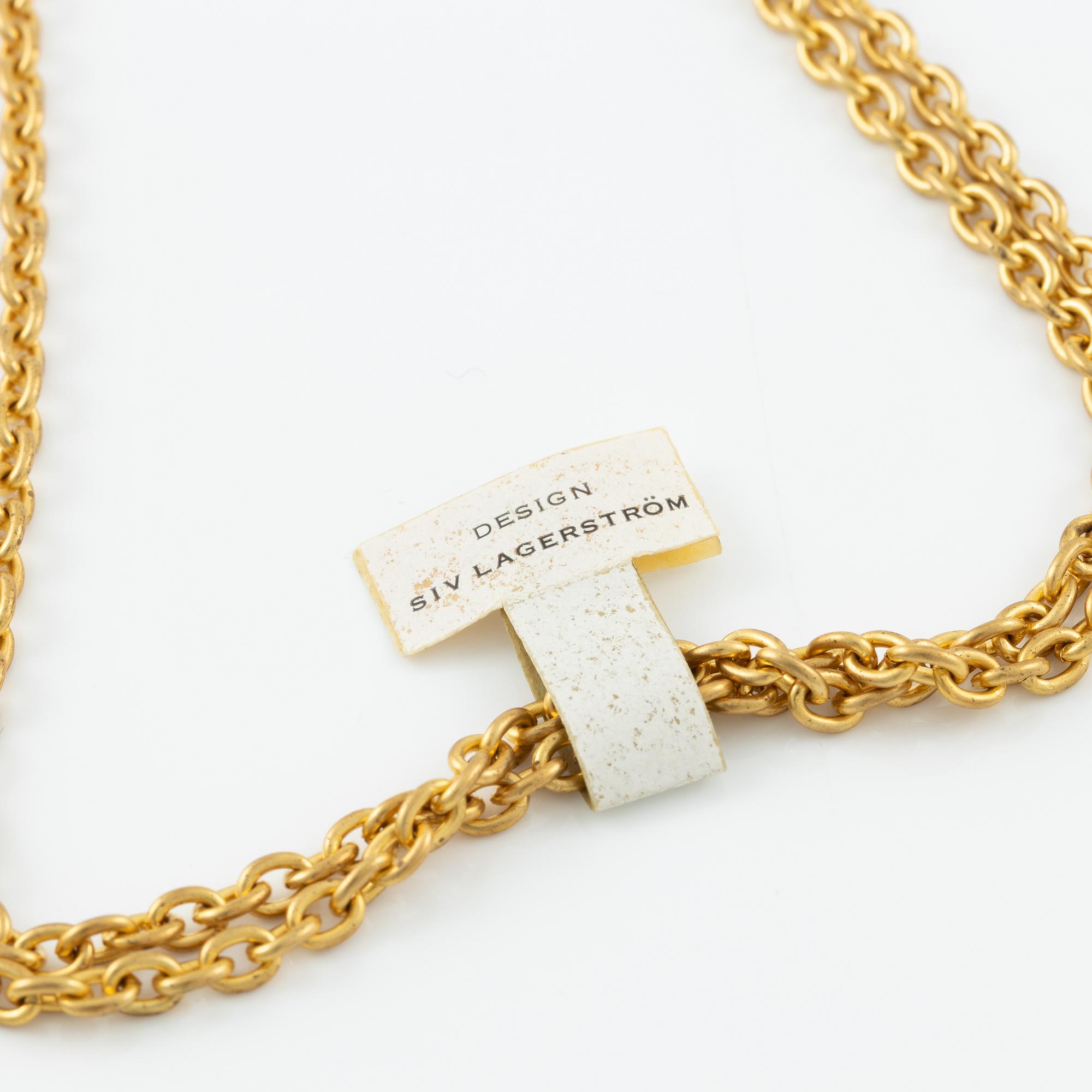 Siv Lagerström, two collars, gold-coloured metal.
