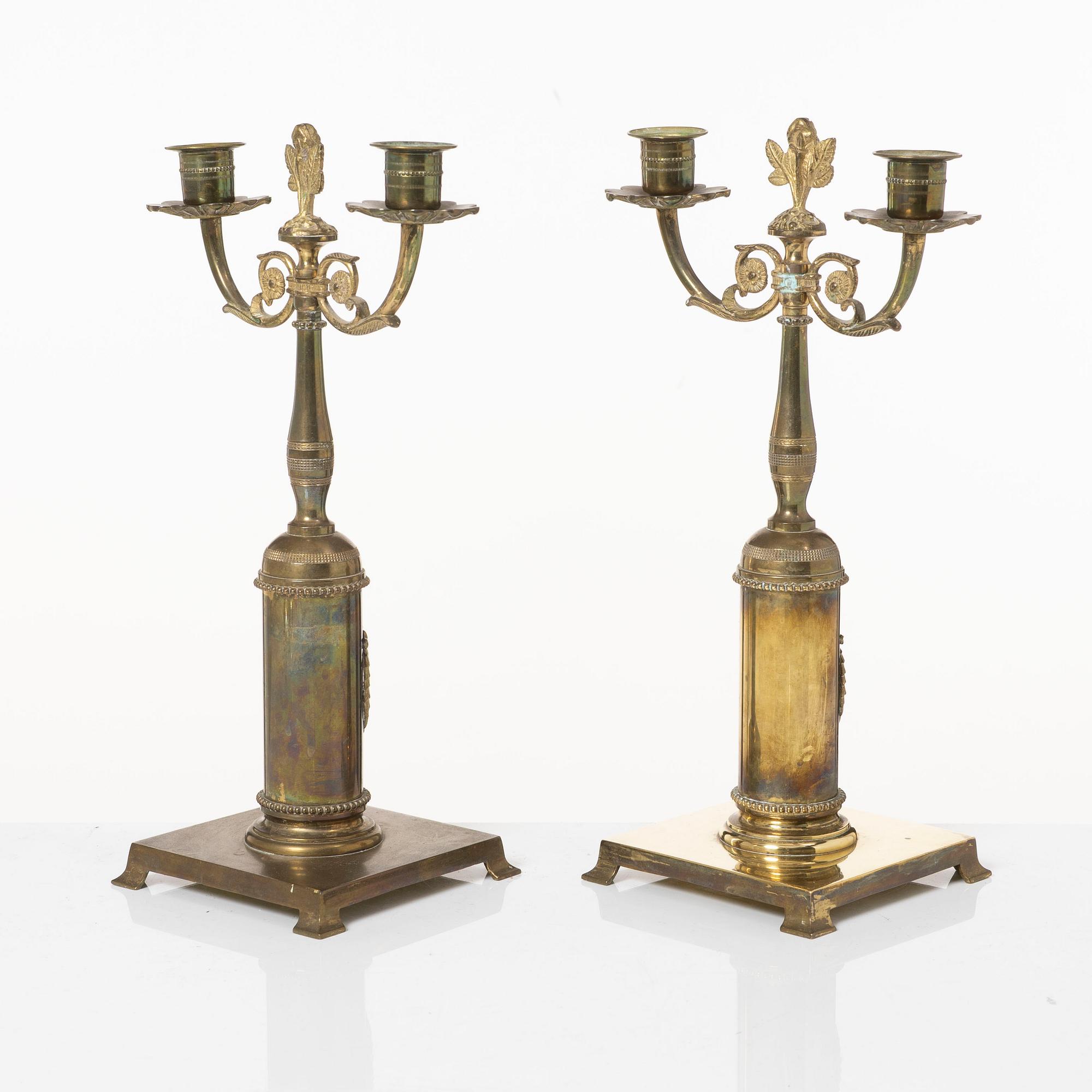 Candle holders, a pair of brass, Empire style, 20th century.