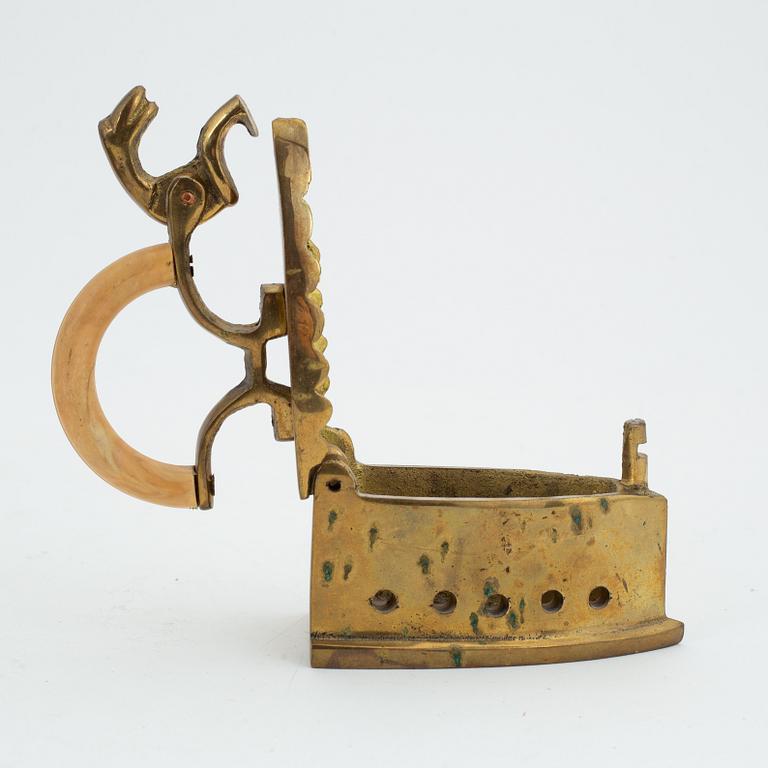 Two brass iron, early 19th century.