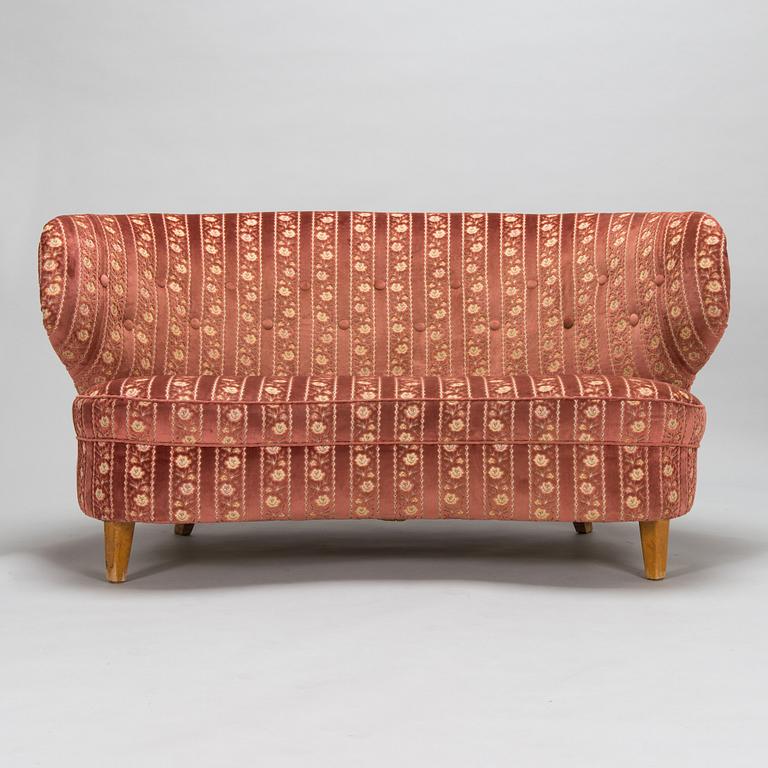 A mid-20th-century sofa.