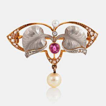 1146. An 18K gold and platinum brooch set with pearls, rose-cut diamonds and a ruby.