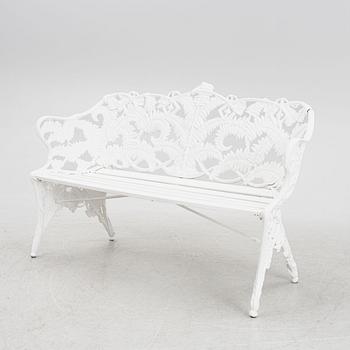 A garden sofa, early 20th Century.