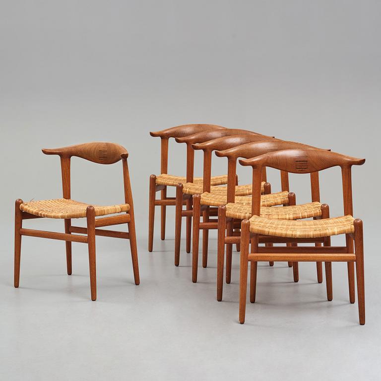 Hans J. Wegner, a set of six teak and rattan "Cowhorn Chairs" "JH-505", executed by cabinetmaker Johannes Hansen, Denmark 1950-60's.