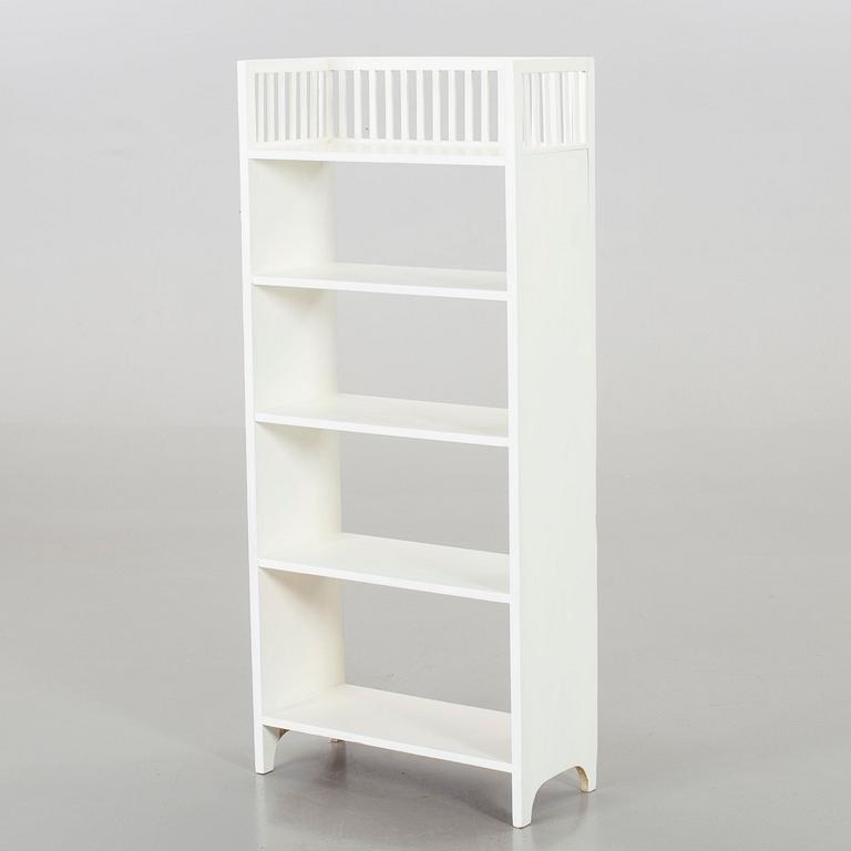 AN ART NOUVEAU BOOKSHELF.