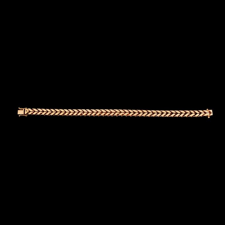 A Stern gold bracelet.