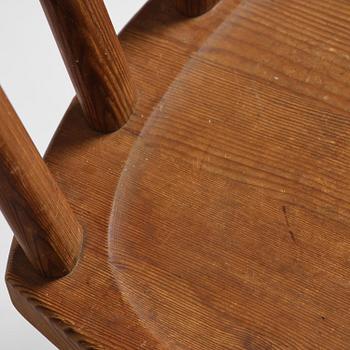 Axel Einar Hjorth, a set of three stained pine "Utö" chairs, Nordiska Kompaniet, Sweden, 1930s.