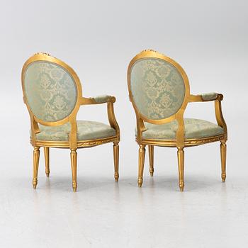 A pair of armchairs, Gustavian style, early 20th century.