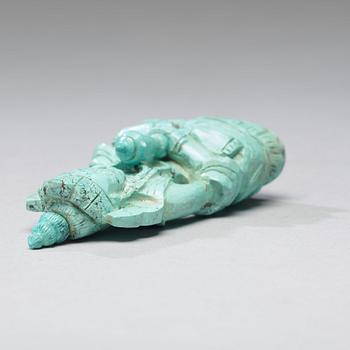 A turquoise figure of a bodhisattva, Tibet, late 19th Century.