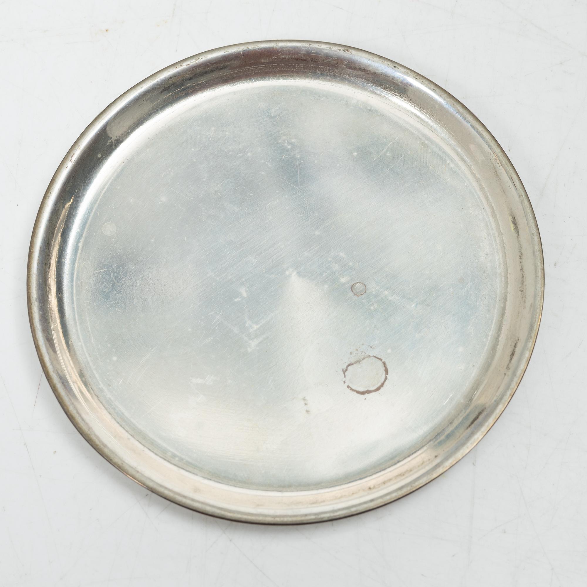 Eight coasters, silver 900, 20th century.