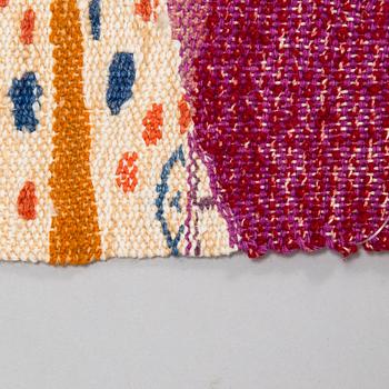 Eva Anttila, a tapestry signed EA.