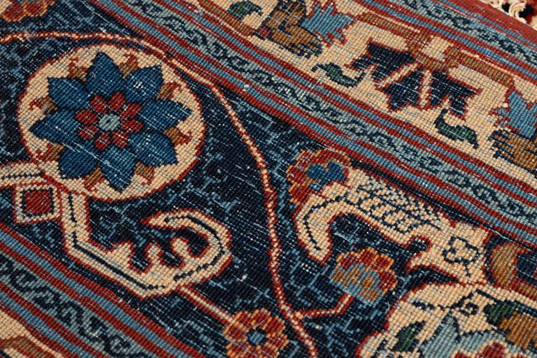 A carpet, antique/semi-antique, Teheran/Nain Tuteshk, ca 314 x 211 cm.