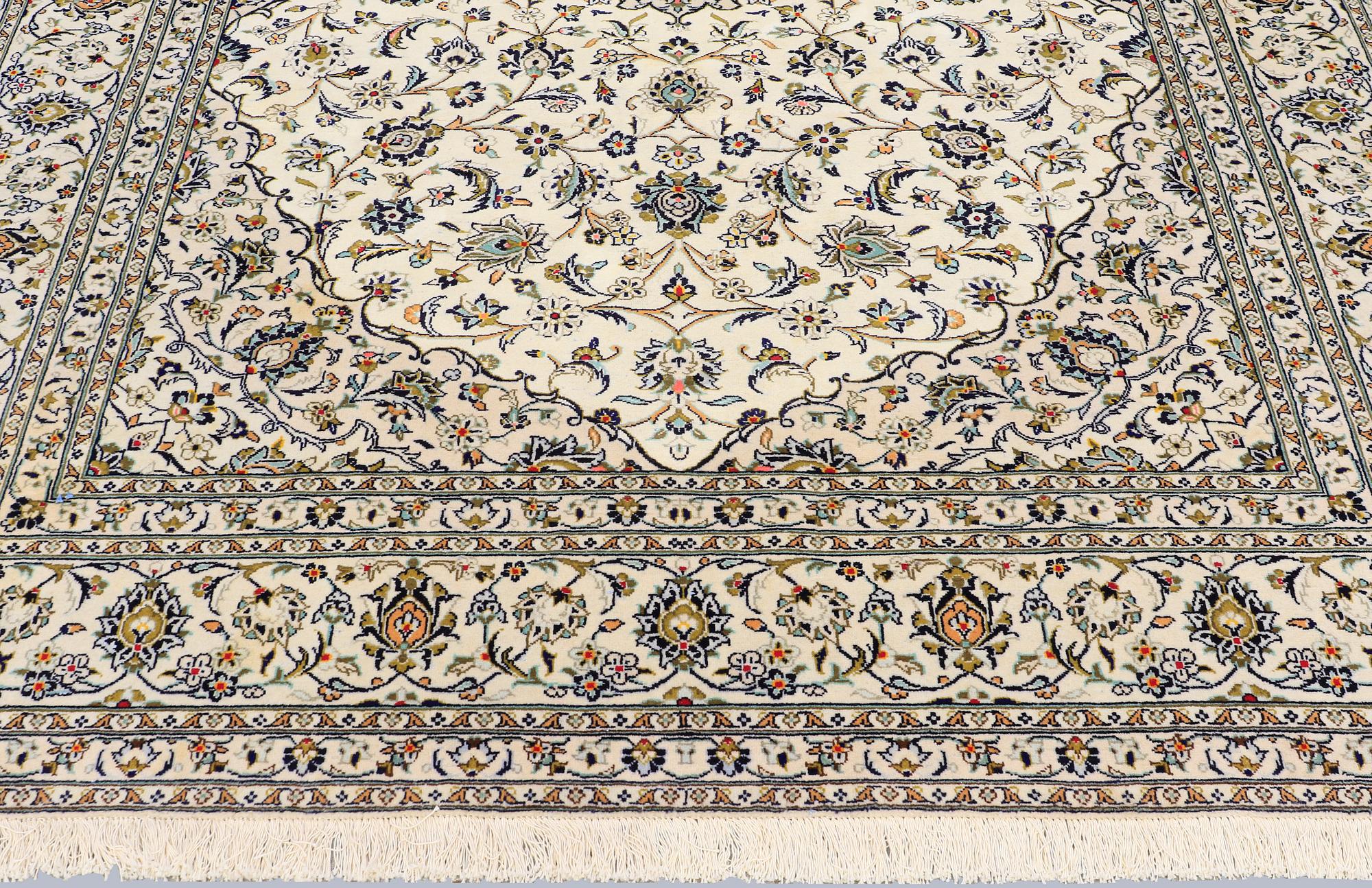 A Keshan carpet, approx. 353 x 251 cm.