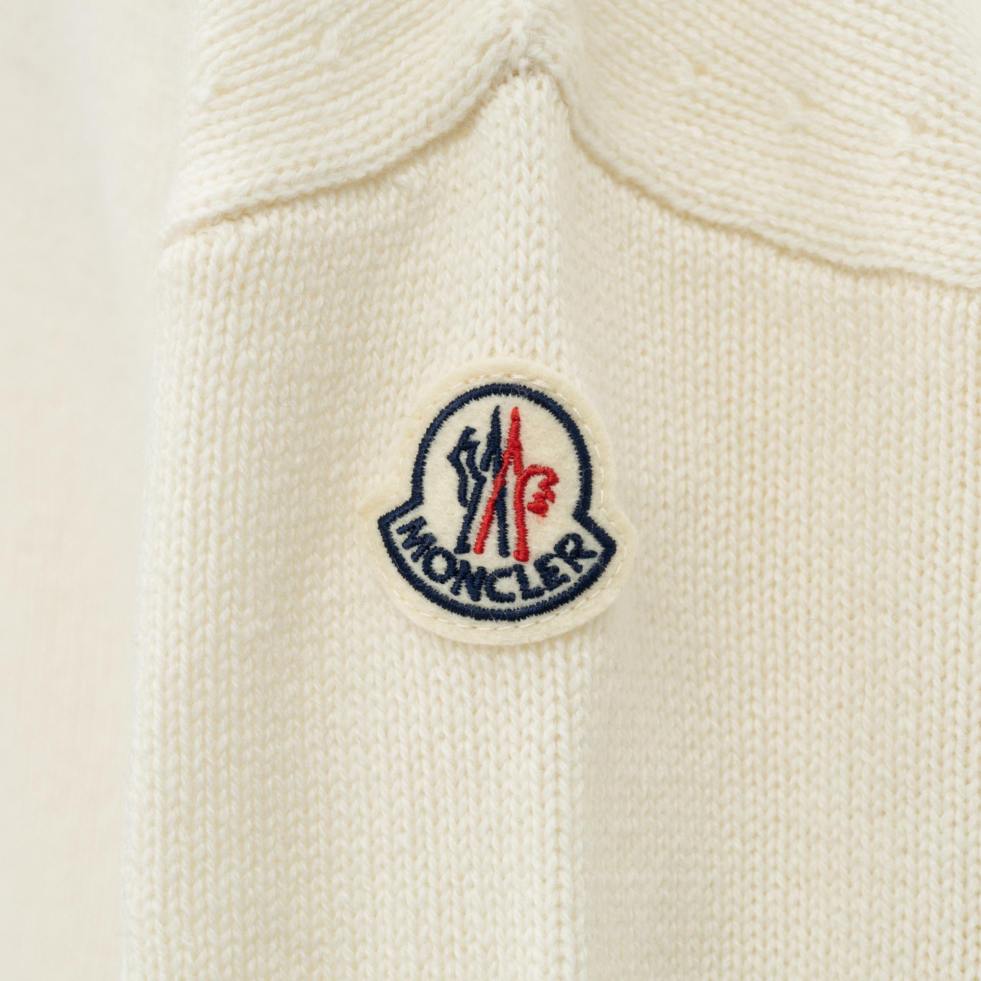 Moncler, A 'Lupetto tricot' wool turtleneck sweater, size M.