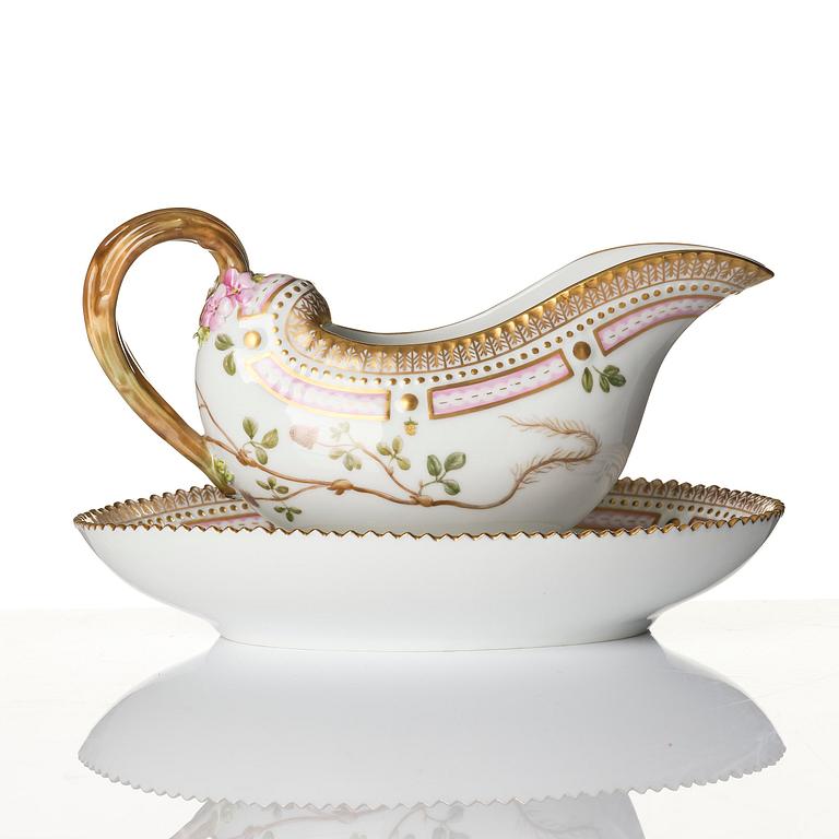 A Royal Copenhagen 'Flora Danica' sauce boat and a pillow shaped bowl, Denmark, 20th century.