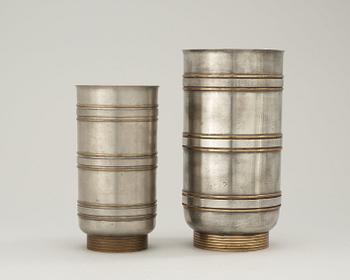 Two Edvin Ollers pewter and brass vases, Schreuder & Olsson, Stockholm 1937 och 1960.
