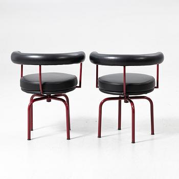 Charlotte Perriand, /Le Corbusier, swivel armchairs, a pair, model LC7, Cassina, Italy, latter half of the 20th century.