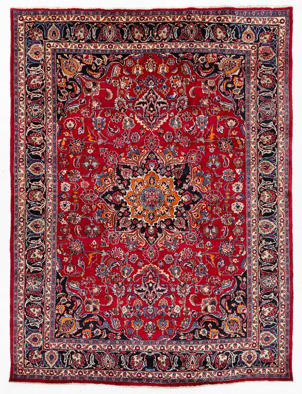 A carpet, Oriental, c. 335 x 257 cm.