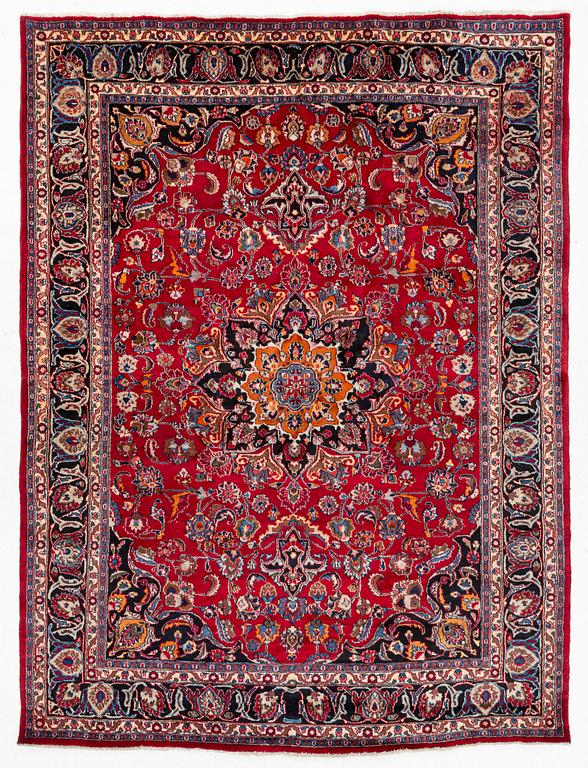 A carpet, Oriental, c. 335 x 257 cm.