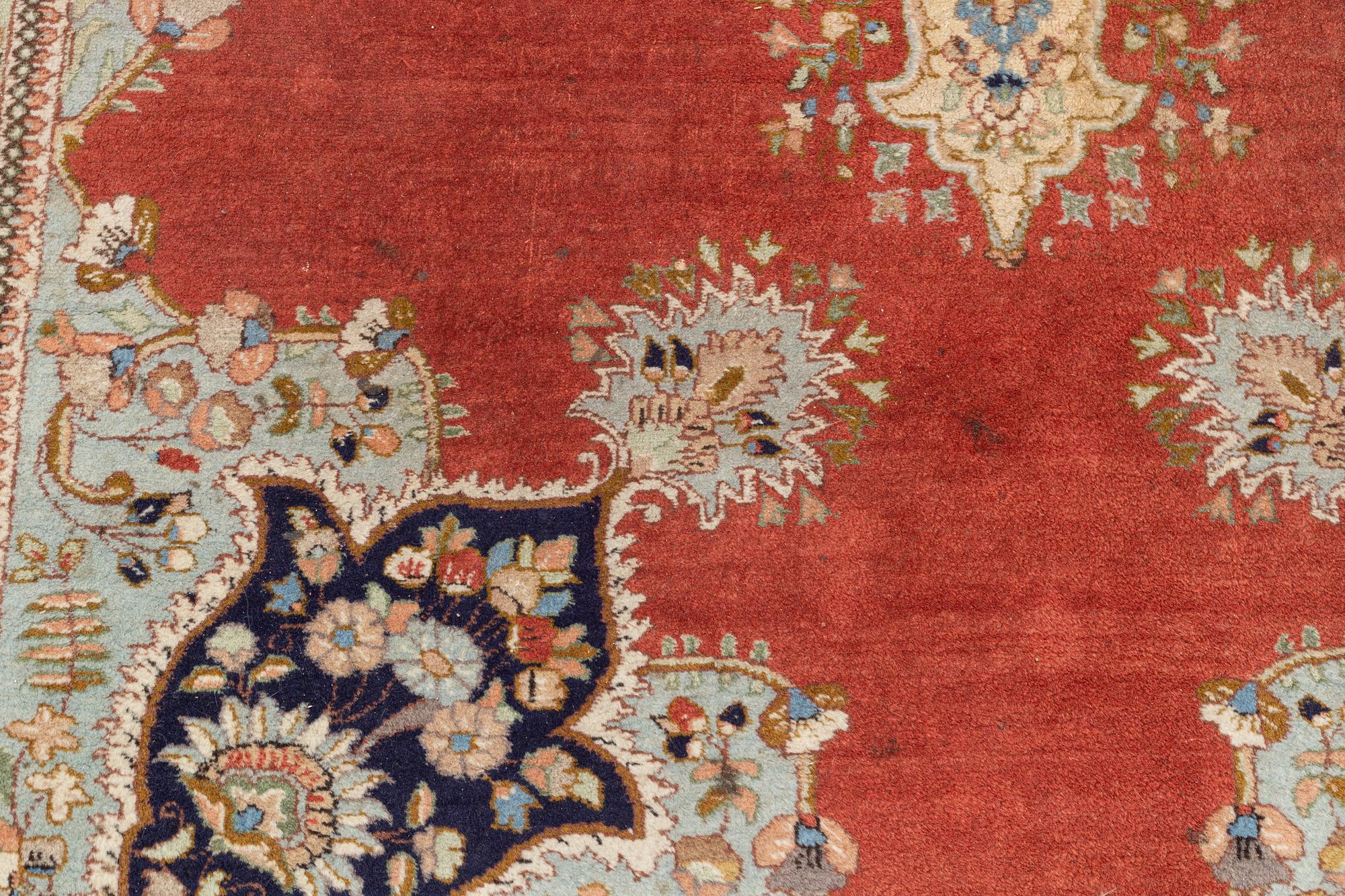 A carpet, Tabriz, ca 300 x 194 cm.