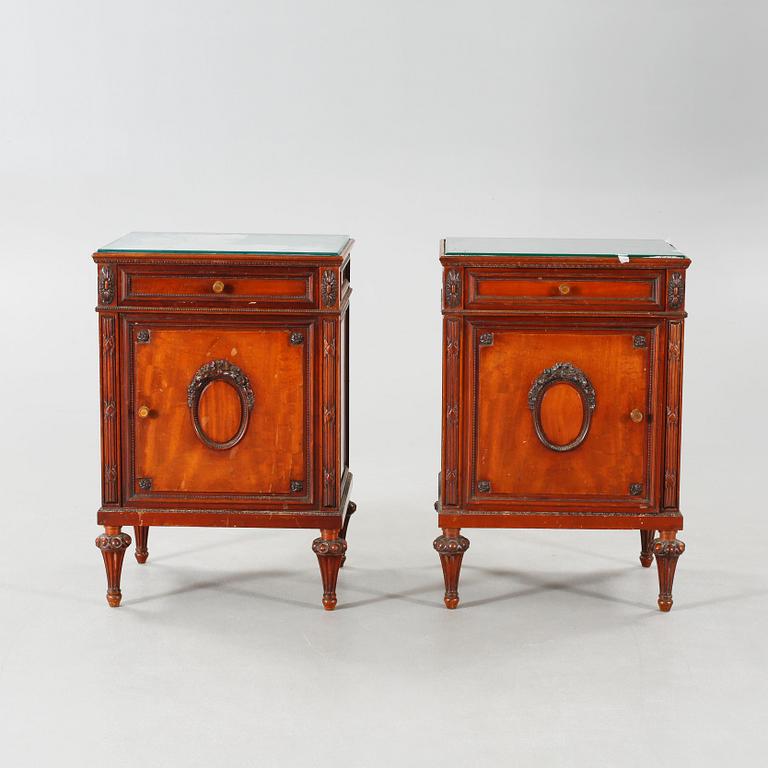 A pair of early 20th century bedside tables.