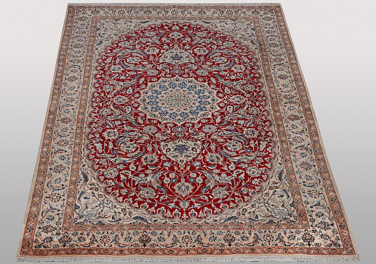 A carpet, Nain, part silk, 9 Laa, ca 295 x 178 cm.