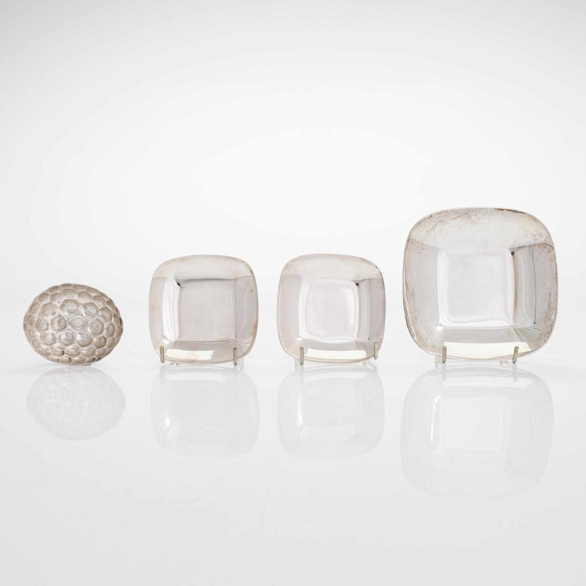 Tiffany & Co MAKERS, a four piece set of sterling silver bowls, salt and pepper shakers by other maker.
