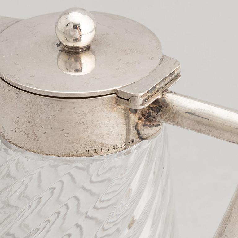 A German glass and silver carafe, mark of Wilhelm Binder, Bremen, Schwäbisch Gmünd, circa 1900.