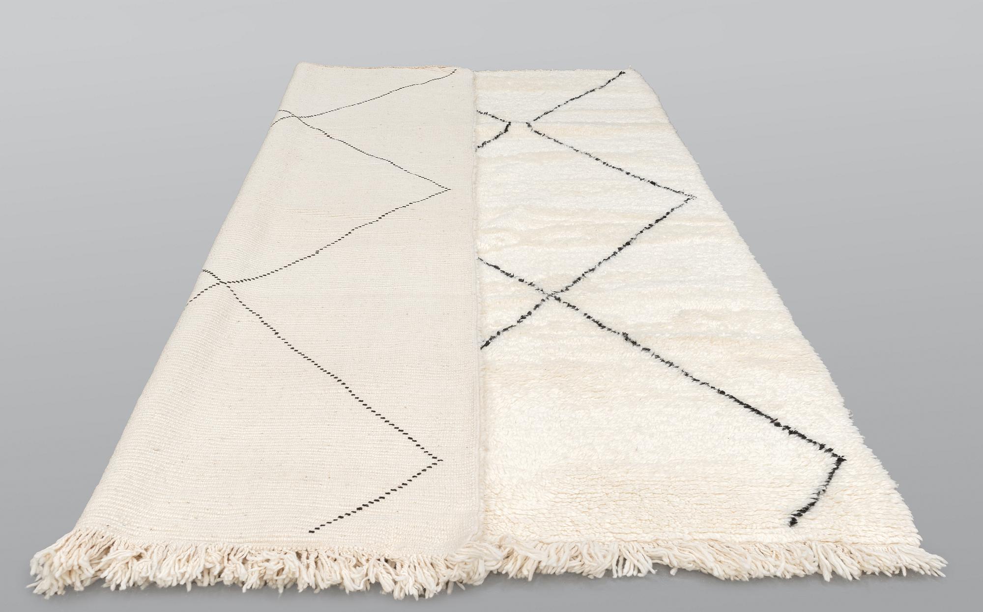 A Moroccan carpet, 297 x 206 cm.