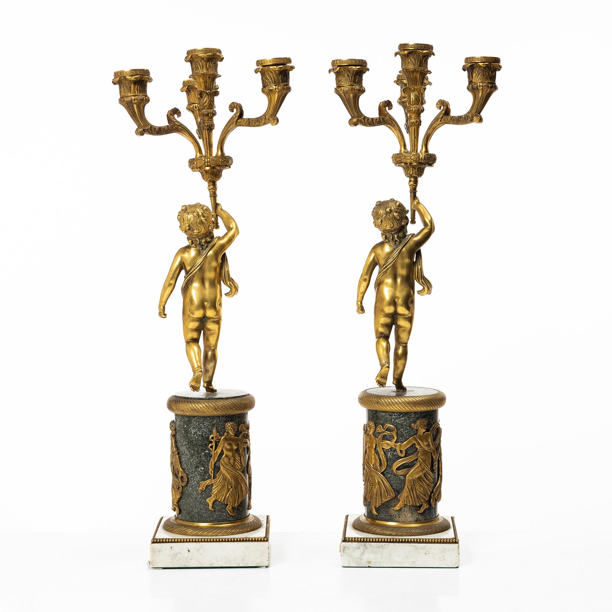 A pair of Empire style candelabra, circa 1900.
